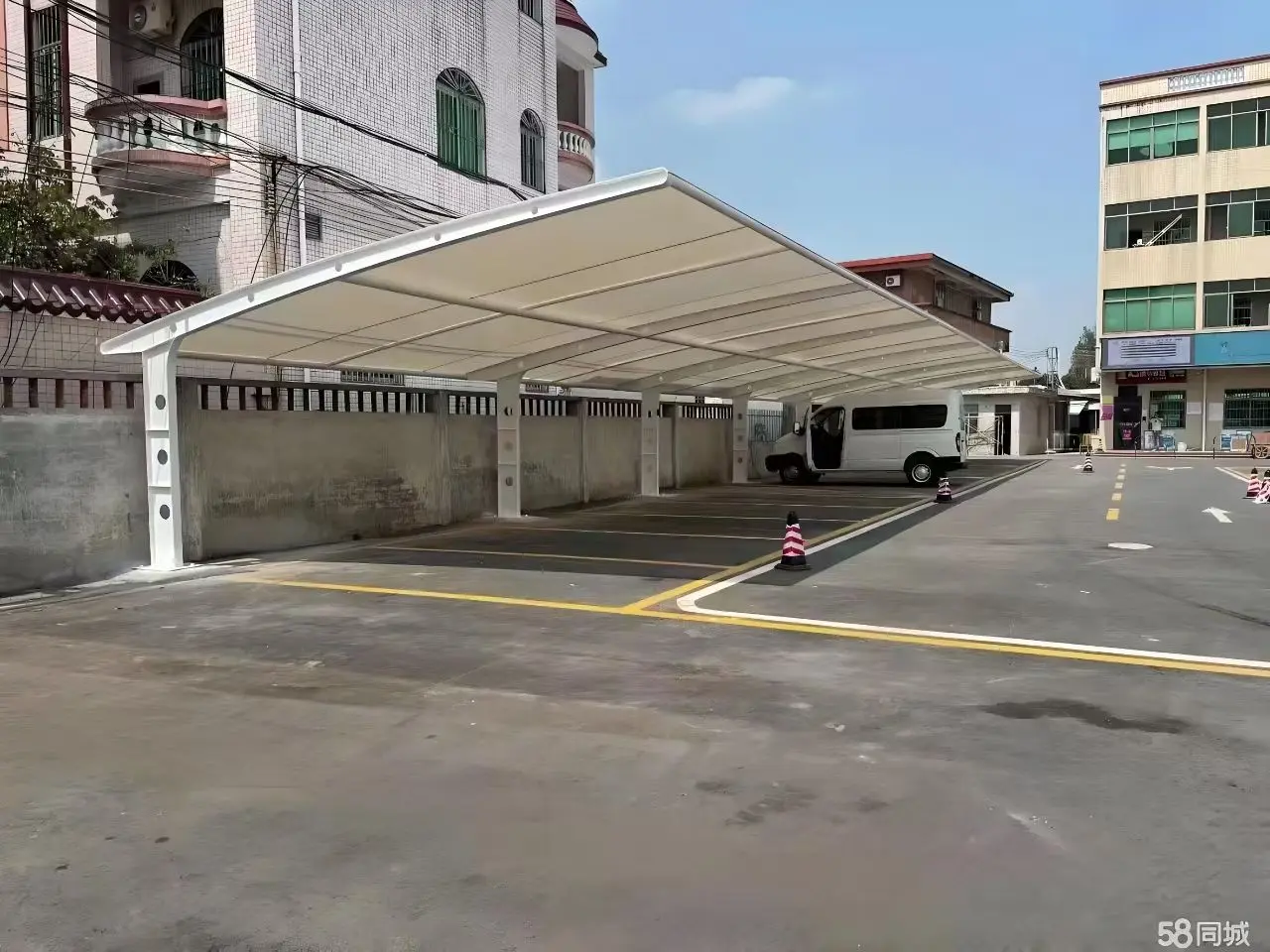 贵州印江膜结构工程科普:山地多雨强紫外环境,停车棚选材别只看低价